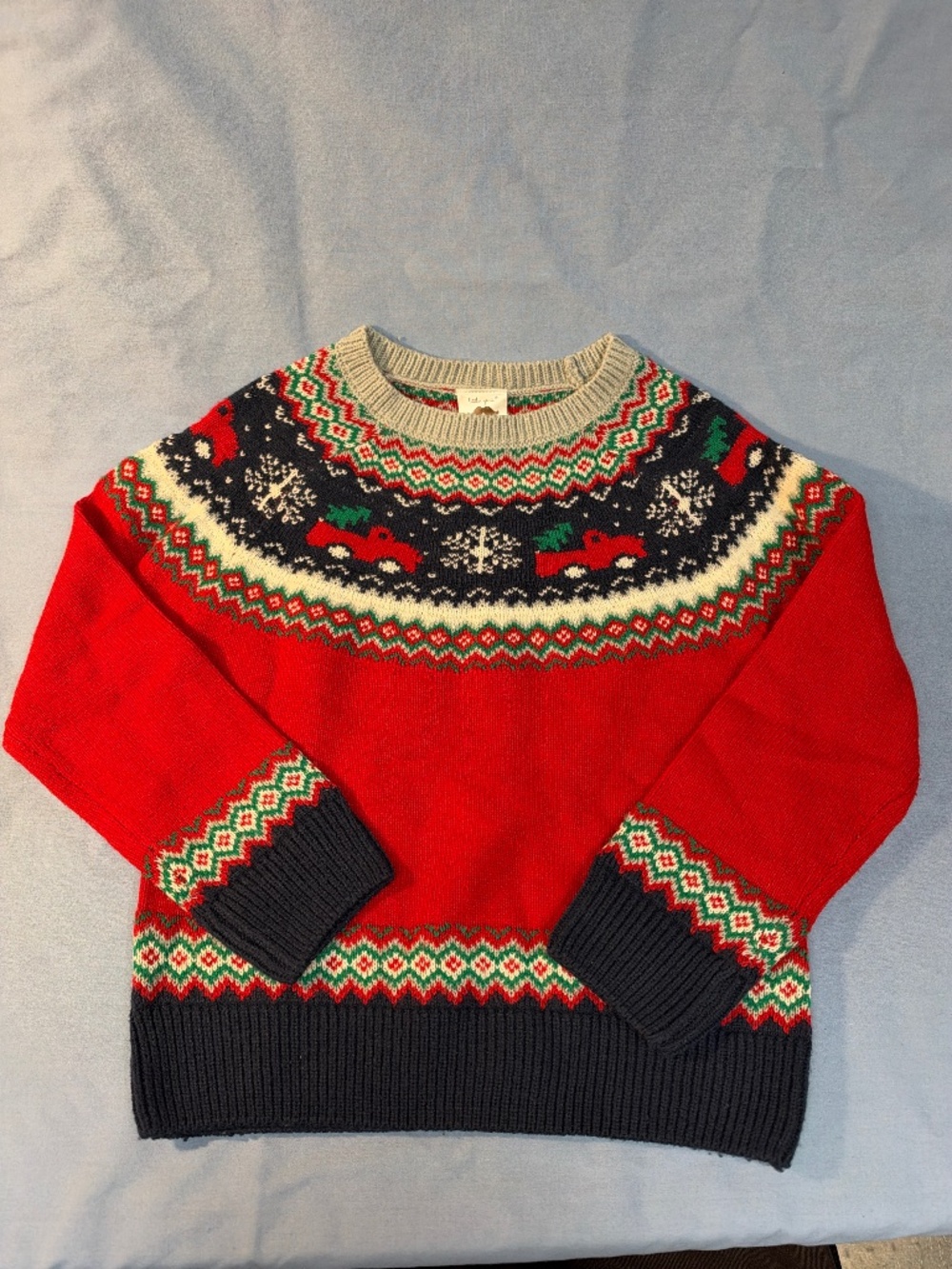 Little gent size 7 Youth. Red truck and snowflake design.